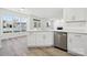 Eat-in kitchen with stainless steel appliances and white cabinets at 6518 Afterglow Dr, Indian Trail, NC 28079