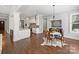 Open concept kitchen with breakfast nook and hardwood floors at 6819 Conservatory Ln, Charlotte, NC 28210