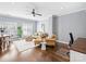 Bright and airy living room with hardwood floors and comfortable seating at 6819 Conservatory Ln, Charlotte, NC 28210