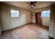 Bedroom featuring paneled walls, ceiling fan, and hardwood floors at 6862 Royal Heights Cir, Hickory, NC 28602