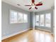 Bright bedroom with hardwood floors and windows at 701 N Church St # 9, Charlotte, NC 28202