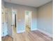 Bedroom with hardwood floors and access to bathroom at 701 N Church St # 9, Charlotte, NC 28202