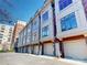 Townhouses with attached garages and brick facade at 701 N Church St # 9, Charlotte, NC 28202