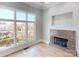 Bright Gathering room with fireplace and hardwood floors at 701 N Church St # 9, Charlotte, NC 28202