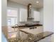 Modern kitchen with granite countertops and stainless steel appliances at 701 N Church St # 9, Charlotte, NC 28202