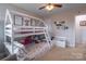 Well-lit bedroom featuring a bunk bed and playful decor at 748 Inwood Hill Dr, Gastonia, NC 28056