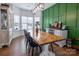 Farmhouse-style dining room, featuring a large wooden table at 748 Inwood Hill Dr, Gastonia, NC 28056