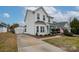 Two-story white house with driveway and garage at 748 Inwood Hill Dr, Gastonia, NC 28056