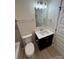 Updated bathroom with vanity and toilet at 757 Bilmark Ave, Charlotte, NC 28213