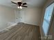 Bedroom with ceiling fan and hardwood floors at 757 Bilmark Ave, Charlotte, NC 28213