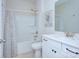 Clean bathroom with a shower/tub combo and vanity at 8119 Merryvale Ln, Charlotte, NC 28214