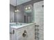 Walk-in shower with glass enclosure and modern fixtures at 8119 Merryvale Ln, Charlotte, NC 28214