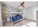 Charming bedroom with a dinosaur-themed wall and a bunk bed at 975 Shorthill Ln, Fort Mill, SC 29715