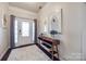 Bright and airy foyer with hardwood floors and modern decor at 975 Shorthill Ln, Fort Mill, SC 29715