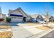 House exterior showcasing a two-car garage and landscaped front yard at 975 Shorthill Ln, Fort Mill, SC 29715