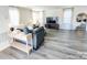 Living room with hardwood floors and neutral-toned furniture at 1163 Ryan Meadow Dr, Monroe, NC 28110