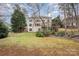 Spacious backyard with a two story home and deck at 11805 Prestmoor Ct, Charlotte, NC 28262