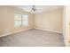 Simple bedroom with carpet and double window at 11805 Prestmoor Ct, Charlotte, NC 28262