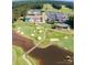 Aerial view of community with clubhouse, pool, tennis courts, and golf course at 13234 Hidcote Ct, Huntersville, NC 28078