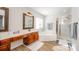 Elegant bathroom with double vanity, soaking tub, and shower at 13234 Hidcote Ct, Huntersville, NC 28078