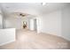 Main bedroom with high ceiling, fan, and ensuite bath at 13234 Hidcote Ct, Huntersville, NC 28078