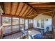 Screened porch with access to backyard and additional seating at 13234 Hidcote Ct, Huntersville, NC 28078