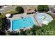 Aerial view of community pool with surrounding amenities at 141 Silverspring Pl, Mooresville, NC 28117