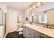 Elegant bathroom with double vanity and a large mirror at 141 Silverspring Pl, Mooresville, NC 28117