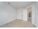 Bright bedroom with double doors leading to a closet at 14311 Riding Hill Ave, Charlotte, NC 28213