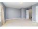 Spacious bedroom with grey walls and carpeted floors at 14311 Riding Hill Ave, Charlotte, NC 28213