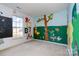 bedroom with whimsical wall mural and chalkboard accent at 14311 Riding Hill Ave, Charlotte, NC 28213