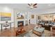 Comfortable living room with fireplace, hardwood floors, and sliding doors to outdoor space at 14531 Crosswater Ln, Charlotte, NC 28278