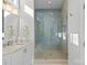 Shower features glass doors, modern tile, and a bench for maximum comfort at 14531 Crosswater Ln, Charlotte, NC 28278