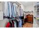 Spacious walk-in closet featuring custom shelving for optimal storage and organization solutions at 14531 Crosswater Ln, Charlotte, NC 28278