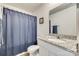 Clean bathroom with shower/tub combo, granite countertop, and updated vanity at 1529 Cannan Mountain Dr, Newton, NC 28658