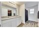 Double vanity bathroom with granite countertop and shower at 1529 Cannan Mountain Dr, Newton, NC 28658