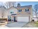 Two-story house with a two-car garage and landscaped yard at 1529 Cannan Mountain Dr, Newton, NC 28658