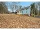 House sits on a large lot with wooded surroundings at 161 Moore Haven Dr, Salisbury, NC 28147