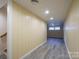 Basement hallway with light wood flooring at 161 Moore Haven Dr, Salisbury, NC 28147