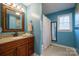 Bathroom with granite top vanity and tub shower combo at 161 Moore Haven Dr, Salisbury, NC 28147