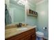 Bathroom with granite countertop, double vanity, and decorative mirror at 161 Moore Haven Dr, Salisbury, NC 28147