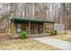 Charming guest house with porch and wooded views at 161 Moore Haven Dr, Salisbury, NC 28147