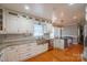 Kitchen with island, stainless steel appliances, and hardwood floors at 161 Moore Haven Dr, Salisbury, NC 28147