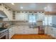 Spacious kitchen with white cabinets, granite countertops, and stainless steel appliances at 161 Moore Haven Dr, Salisbury, NC 28147