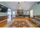 Spacious living room features a stone fireplace and hardwood floors at 161 Moore Haven Dr, Salisbury, NC 28147