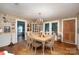 Dining room with hardwood floors and a wooden table at 1979 Charlotte Hwy, Mooresville, NC 28115