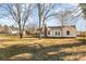 Backyard view of a ranch house with large yard at 1979 Charlotte Hwy, Mooresville, NC 28115