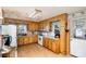 Kitchen with light wood cabinets and vinyl flooring at 1979 Charlotte Hwy, Mooresville, NC 28115