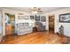 Living room with hardwood floors and a view of the kitchen at 1979 Charlotte Hwy, Mooresville, NC 28115