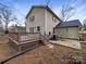 Home features a deck and a partially fenced backyard at 209 Vermont Dr, Stanley, NC 28164